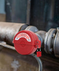 2 Pack Ball Valve Lockout Device Heavy Duty Padlock on a gate valve, fits 1 to 2 inch pipes, used for industrial safety.