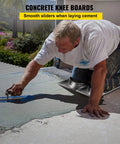 Man using Concrete Knee Board Sliders 28 X 8 Inch Pair With Stainless Steel Kneeboards for smooth trowel and edge protection on concrete