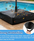 Patio Umbrella Base Cover For Square Stands Heavy Duty 600D Waterproof Anti UV Weatherproof Cover Only 30 Inch By 30 Inch By 5 Inch Black Fits Most Square Bases, showing elastic ropes securing cover.