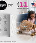 Child playing with cat in room, MERV 11 Air Filter Six Pack 18x20x1 Inch For Home AC Furnace And HVAC Systems highlighted in corner.