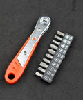 Compact 4.37 Inch Mini Ratchet Screwdriver With 36 Tooth Reversible Drive Slim Handle Precision Tool For Tight Spaces Cabinets Electronics And DIY Projects A Handy Go To Lightweight Pick next to screwdriver bits on black surface.