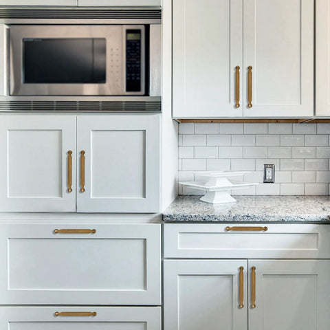 Installed 10 Pack 5 Inch Cabinet Pulls Antique Brass Zinc Alloy Drawer Pulls on white kitchen cabinets