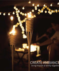 Faux Bamboo Outdoor Torches 4 Pack Sundried Color 60 Inch Tall Island Citronella Torches For Backyard Lighting at night event