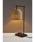 Bahama Table Lamp With Dark Bronze Finish For Warm Coastal Modern Vibes, showing a 24.5in height and rattan basket shade on white surface.