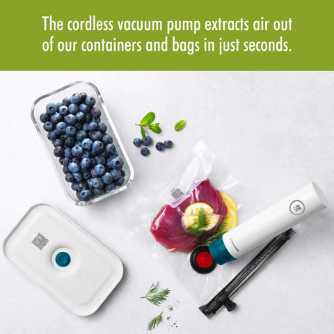 Fresh & Save La Mer Handheld Food Saver Vacuum Pump For Quick Sous Vide Sealing, blueberries in container with vacuum pump