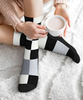 Fresh Black And White Piano Grid Print Crew Socks For Men And Women Straight Up Comfy Polyester Athletic Hosiery on cozy background.