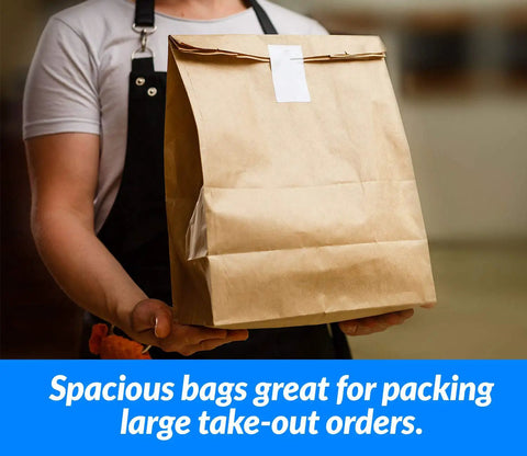 Person holding Heavy Duty Brown Kraft Paper Bags 125 Count Large 12 By 7 By 17 Inches 70 Pound Basis Weight Bulk Pack
