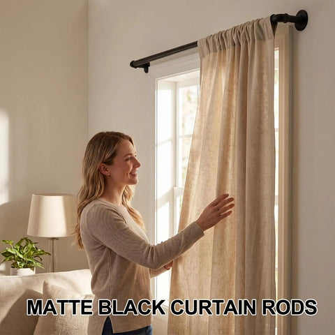 Person adjusting curtains on industrial black curtain rods 18 to 88 inch adjustable length 1 inch diameter pipe for wall mount