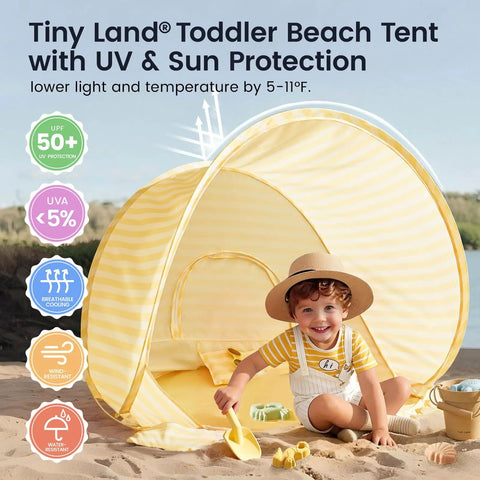 Child playing in sand with Pop Up Baby Beach Tent With 2026 Upgraded UV Protection Lightweight Portable Sun Shelter in yellow stripes