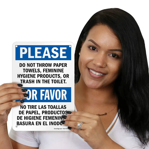 Please Do Not Flush Paper Towels Or Trash In The Toilet Bilingual Sign 7x10 Plastic built tough HDPE, held by woman
