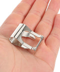 Universal Auto Windshield Wiper Linkage Repair Clips Kit Built Tough With Heavy Duty Stainless Steel held in a hand for easy installation.