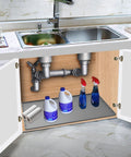 Under Sink Mat For Kitchen Waterproof 34 x 22 Inch Silicone Cabinet Liner With Lip in gray protecting cabinet interior