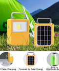 Workhorse 20W Led Portable Work Light And Solar Flood Illuminator With IP65 Grit Resistant Shell and USB charging in a campsite setting.