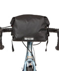 Dayliner Mini Roll Top Handlebar Bag 3 L Waterproof Commuter Sling With Shoulder Strap And Reflective Detail Recycled Ripstop Ideal For City Ride MTB Trek Work Or Weekend Getaways, mounted on bike handlebars
