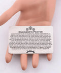 Techie Engineer Gift For Men Engineers Prayer Wallet Card Featuring Electrical And Mechanical Engineering Themed Jewelry For Engineers A Solid Fathers Day Retirement Gift For Dad Or Grandfather, engraved stainless steel card in hand.