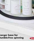 Huge 16 Inch Lazy Susan Turntable With Soft Non Slip Lip And Deep Ledge holding soap bottles, showing large base for stability.