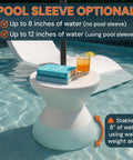 Versatile ShadeTable Pool Umbrella Table For In Pool Or On Deck Use with books and drink on top, shows stability feature.