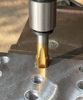 M14 X 2 Spiral Point Tap Pro Grade HSS Titanium Coated 14mm Cutting Diameter Right Hand Plug Threading Tap in use on metal