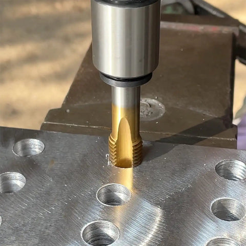 M14 X 2 Spiral Point Tap Pro Grade HSS Titanium Coated 14mm Cutting Diameter Right Hand Plug Threading Tap in use on metal