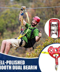 Dual Tandem Zip Line Pulley For 8 To 13mm Rope used in action by a man ziplining, close-up of stainless bearings and aluminum alloy shell.