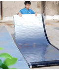 Heavy Duty Bitumen Sealing Tape With Reflective Aluminum Foil Backing shown on a roof for waterproof leak repairs and insulation.