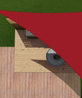 Top view of a red Waterproof Sun Shade Sail Right Triangle 12 Ft By 12 Ft By 17 Ft with Hardware Kit over a wooden patio.