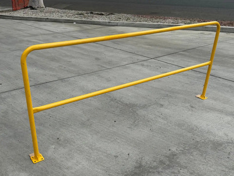 Heavy Duty One Piece Industrial Guardrail No Sweat Surface Mount Safety Railing Aces Inspection Code Compliant yellow railing on concrete surface.