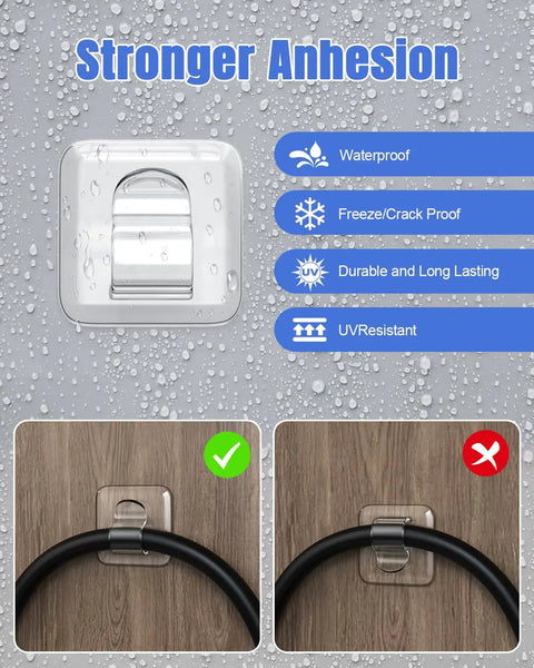 Clear heavy-duty outdoor string light clip with waterproof adhesive installed on a wood surface, demonstrating strong adhesion.