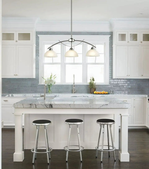Modern Frosted Glass Alabaster Shade Pendant Lighting For Kitchen Island With Arched Rod Hung Sloped Ceiling Brushed Nickel Finish 3 Light Fixture ETL Listed Sleek And On Trend Kitchen Lighting over marble island in a contemporary kitchen.