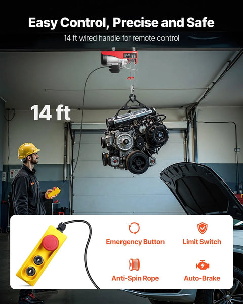 Electric hoist lifting a car engine in a garage; 14 ft wired remote control with yellow handheld unit visible.