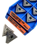 Grab This Hot Deal On Ten PC9030 Carbide Turning Inserts For CNC Steel Milling And Lathe Operations With Serious Wear Resistance And Tough Precision Cutting Performance To Get Your Shop Stuff Done Fast. Triangle carbide inserts in blue storage box.