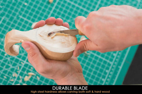 Person using Dead Reliable Wood Carving Hook Knife For Spoon Whittling And Bowl Crafting on wooden bowl, showcasing high carbon steel blade.