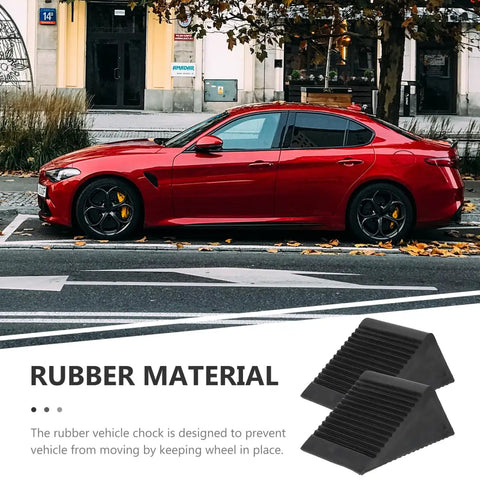 Heavy Duty Rubber Wheel Chocks Set Of 4 For Cars Trailers Trucks And RC Vehicles Grippy Non Slip Tire Stoppers Stabilizer Wedges With Crack Resistant Construction 4.72 Inches By 3.93 Inches By 5.90 Inches next to a parked red car
