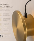 DANCYHOME 6.7" Rechargeable LED Wall Sconce in Brushed Brass with USB-C charging cable connected.