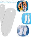 4 Piece Metal Sock Jig Set For Sublimation Dope Gear with straight crew molds, shown with socks for DIY dye printing.