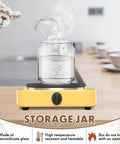 24 Pack Glass Canister Set With Tight Wood Lids For A No Sweat Pantry Setup, 17 Oz Food Jars holding water on a yellow heating base.
