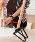 Person assembling furniture with Black Iron Hairpin Table Leg Set, 2 Pack, Heavy Duty Easy Install Metal Furniture Legs visible