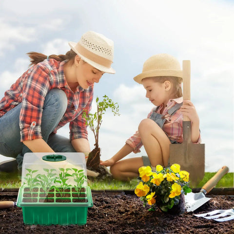 Woman and child gardening with Seed Starter Tray Kit With Grow Lights And Humidity Domes, 6 Packs Indoor Greenhouse Trays