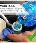 Pouring windshield washer fluid into an open reservoir with the Windshield Washer Fluid Cap Replacement For Ford Focus 2012-2018 visible.