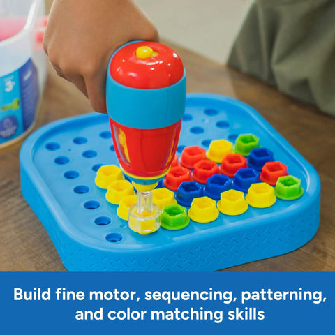 Child using drill on Design And Drill Bolt It Bucket Construction Toys For Toddlers And Kids Tool Set with colorful bolts