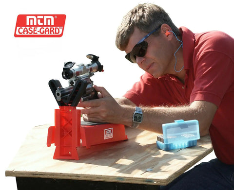 Man using Pistol Sighting In Rest For Handguns, Adjustable Bench Rest With 20 Position Base And Over Molded Rubber Fork Coating