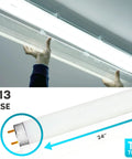 24 Inch T8 Fluorescent Tube Light Bulb 17W 5000K Bright White, 1350 Lumens, G13 Base, being installed in ceiling fixture.