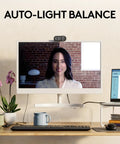 Woman smiling during a video call using Hella Crisp Full Hd 1080p Webcam For Streaming And Remote Meetings Boasting Auto Light Correction.