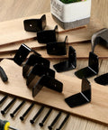 Heavy Duty Black Rafter Clips And Hurricane Brackets With Screws, Tough As Nails Galvanized Steel Beam Ties, 50 Piece Kit on wood with screws and tools.