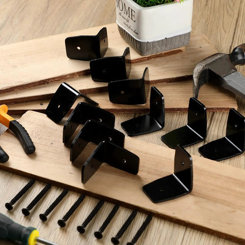 Heavy Duty Black Rafter Clips And Hurricane Brackets With Screws, Tough As Nails Galvanized Steel Beam Ties, 50 Piece Kit on wood with screws and tools.