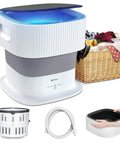 Blue Light Portable Mini Washing Machine With 9L Folding Design next to laundry basket and accessories, 110V-240V US Plug