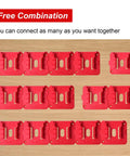 20 Pack Tool And Battery Mounts For 18V M18 Cordless Tools in red ABS plastic, arranged in four rows on a wooden surface.
