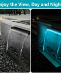 All-In-One Pond Waterfall Kit With LED Lights, 8-Inch Stainless Steel Spillway, 600 GPH Pump, Outdoor Water Feature at night