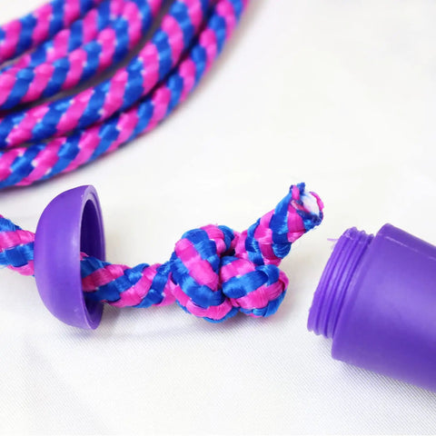 Close-up of purple and pink Adjustable Colorful Jump Rope 3 Pack for Kids and Teens, durable nylon rope with plastic handles.