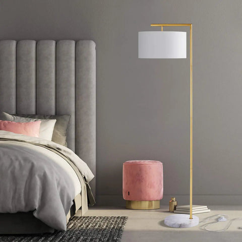 Gold Floor Lamp With Marble Base And White Linen Drum Shade For Living Room Bedroom Study Or Office Modern Metal Floor Light 62 Inch Tall Sleek Home Decor beside a bed and pink pouf